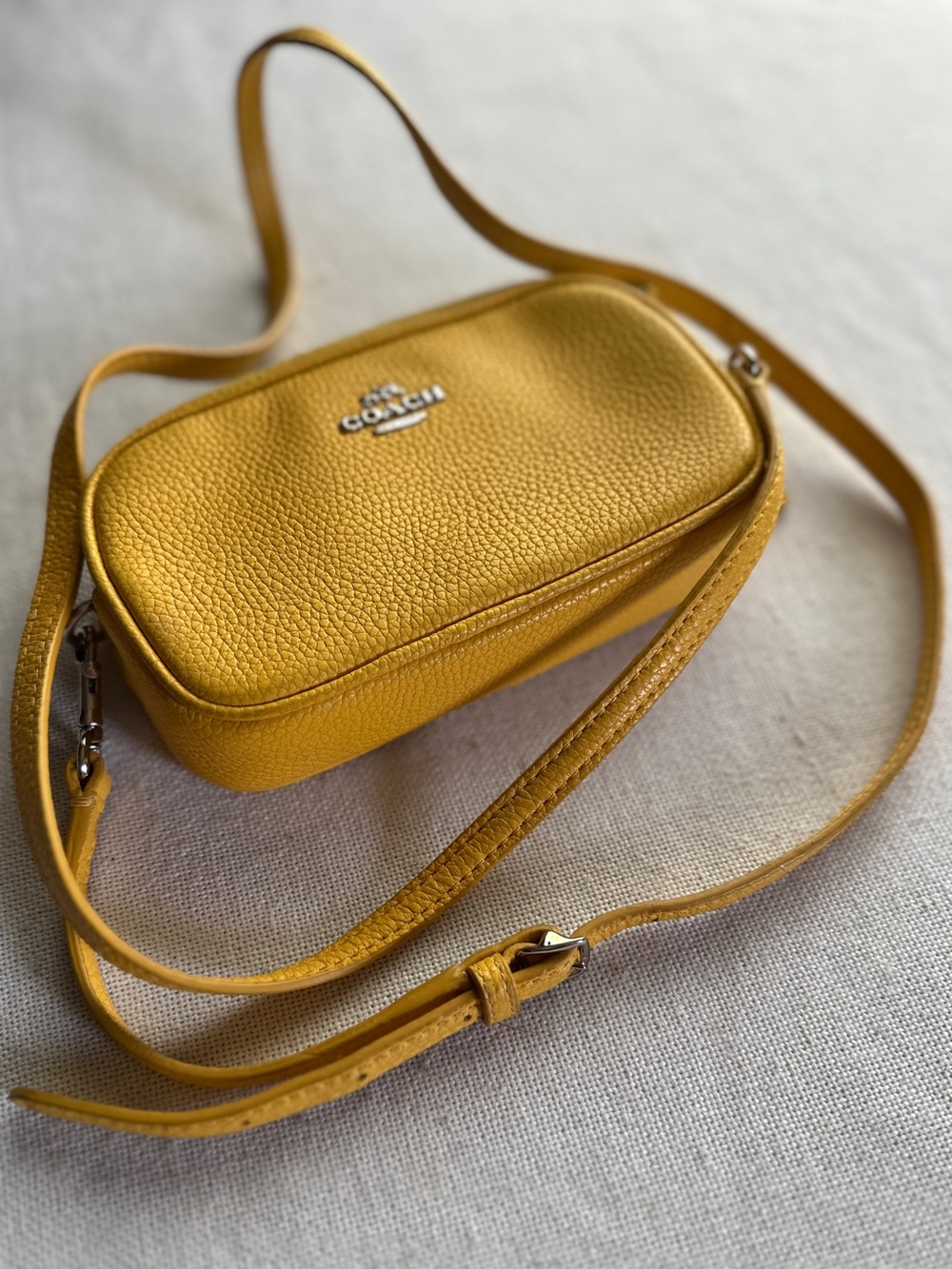 Coach Pebbled Leather Double Zip Mini Crossbody Bag in Vibrant Yellow
